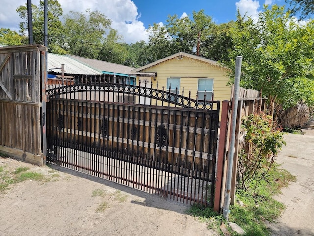 view of gate with fence private yard