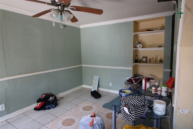 playroom with ornamental molding, ceiling fan, and light tile patterned floors