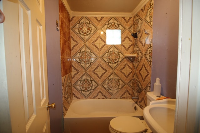 bathroom featuring toilet, ornamental molding, and sink