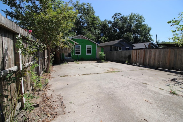exterior space featuring a fenced backyard