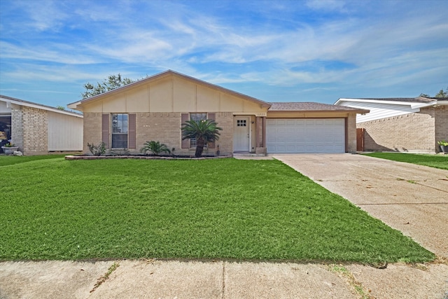 ranch-style home featuring a front yard and a garage