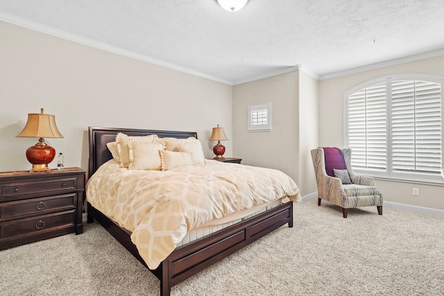 carpeted bedroom with ornamental molding and a textured ceiling