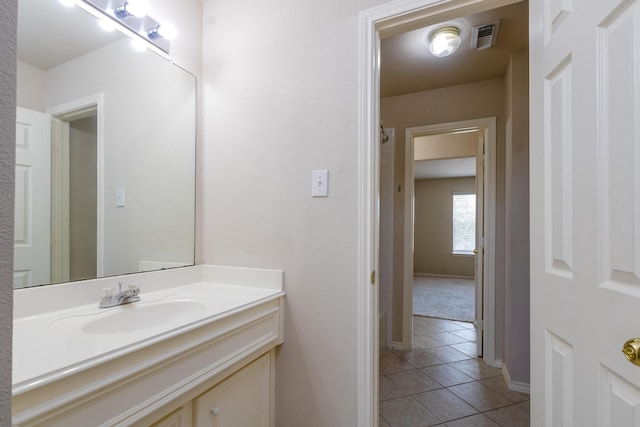 bathroom featuring vanity and tile patterned flooring