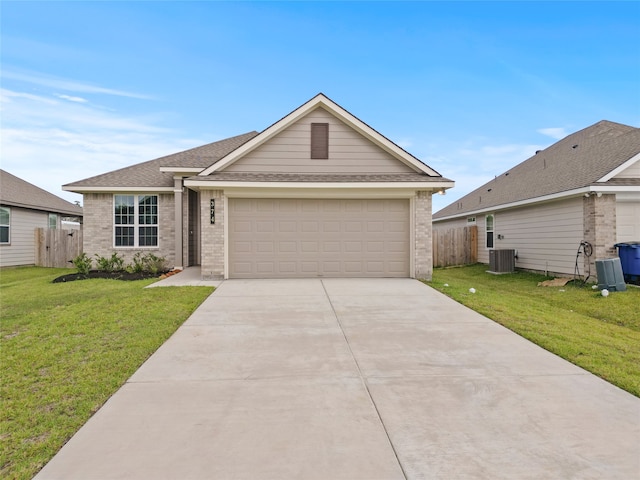 ranch-style home with central air condition unit, a front yard, and a garage