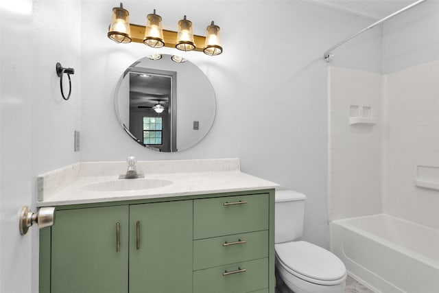 full bathroom featuring toilet, ceiling fan, vanity, and tub / shower combination