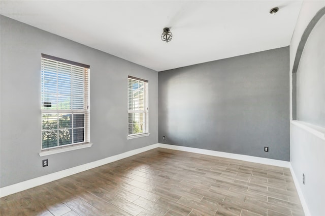 empty room with light wood-type flooring