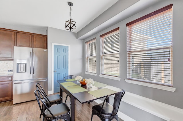 dining room featuring light hardwood / wood-style floors