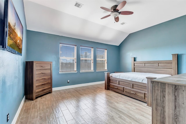 bedroom with lofted ceiling, light wood-type flooring, and ceiling fan