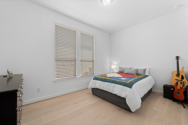 bedroom featuring light wood-type flooring