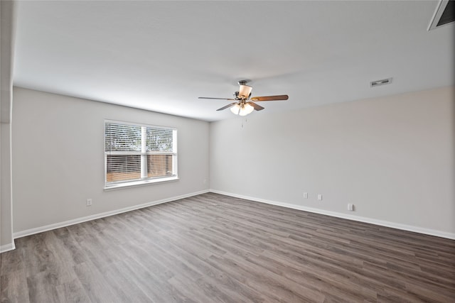 unfurnished room featuring hardwood / wood-style flooring and ceiling fan