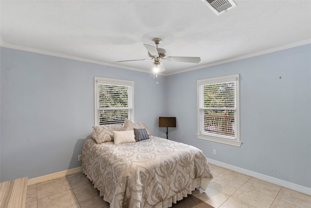 bedroom with crown molding, multiple windows, light tile patterned floors, and ceiling fan