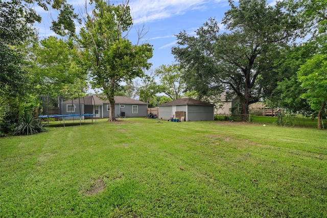 view of yard featuring a trampoline