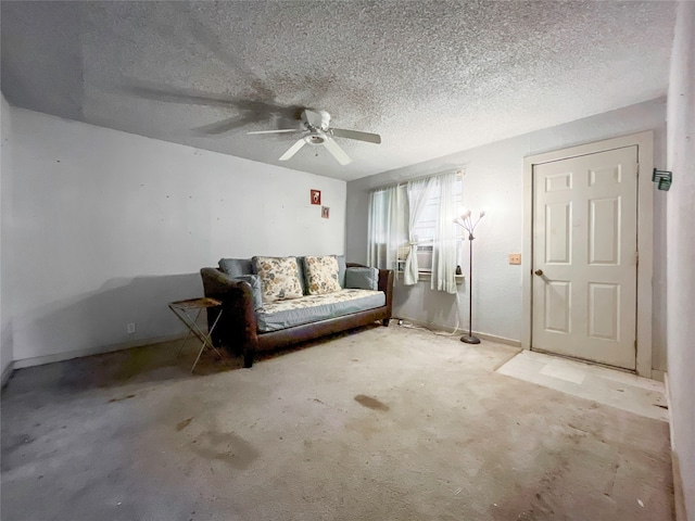 interior space with ceiling fan, light carpet, a textured ceiling, and cooling unit