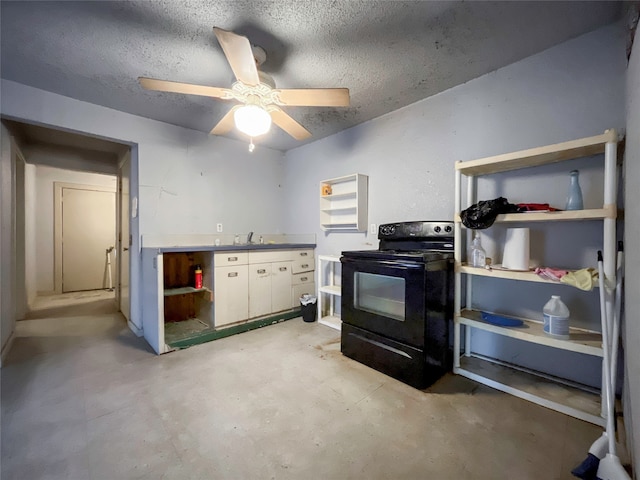 kitchen featuring sink, black / electric stove, white cabinets, a textured ceiling, and ceiling fan