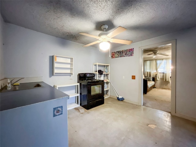 office space with sink, a textured ceiling, and ceiling fan