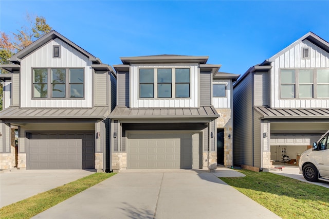 view of front of property featuring a garage