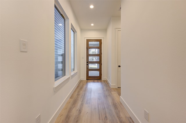 doorway featuring light hardwood / wood-style flooring