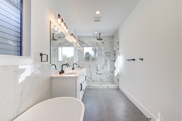 bathroom featuring separate shower and tub, tile patterned flooring, and vanity