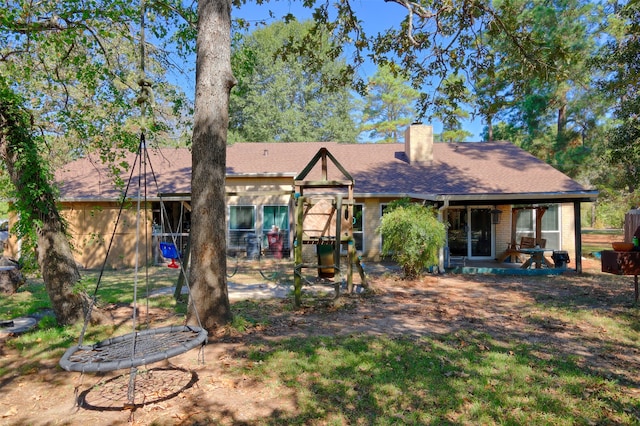 rear view of house featuring a patio