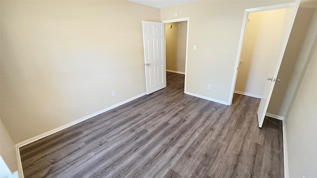 unfurnished bedroom with light wood-type flooring