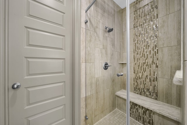 bathroom featuring an enclosed shower