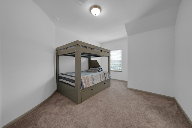 bedroom with light carpet