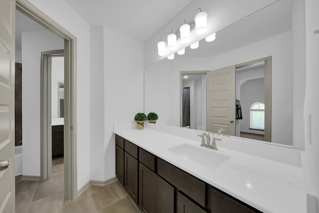 bathroom with vanity and tile patterned floors