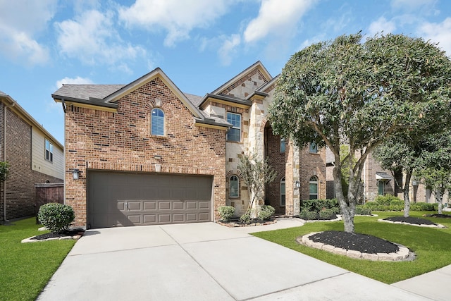 view of front facade with a front lawn and a garage