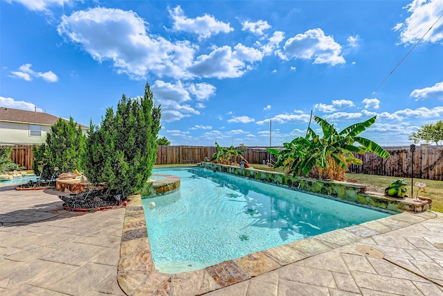 view of pool featuring a patio area