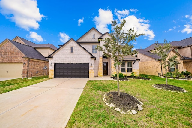 view of front facade with a front yard and a garage