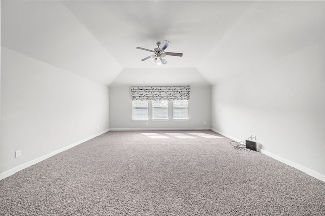 bonus room featuring lofted ceiling and carpet floors