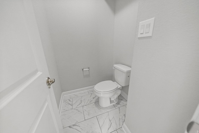 bathroom featuring toilet