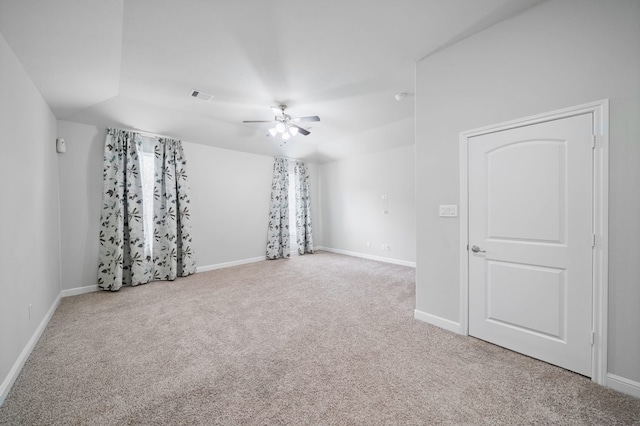 carpeted empty room with ceiling fan