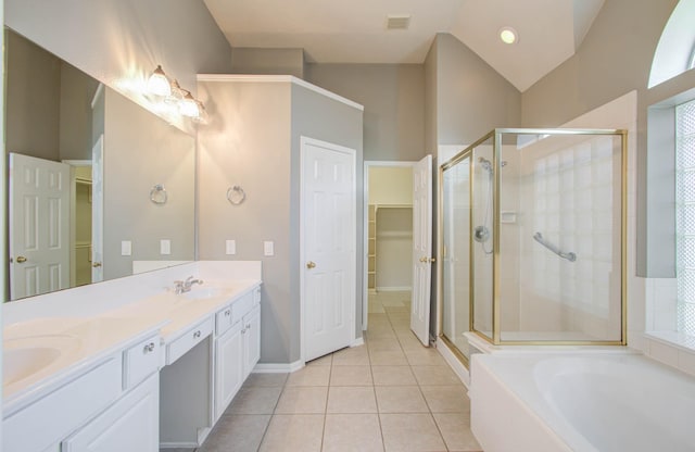 full bath featuring a garden tub, tile patterned floors, a stall shower, a spacious closet, and visible vents