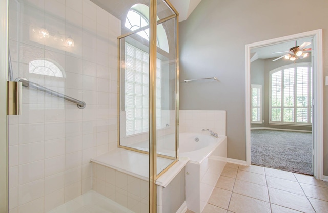bathroom featuring a shower stall, tile patterned flooring, a ceiling fan, a bath, and baseboards