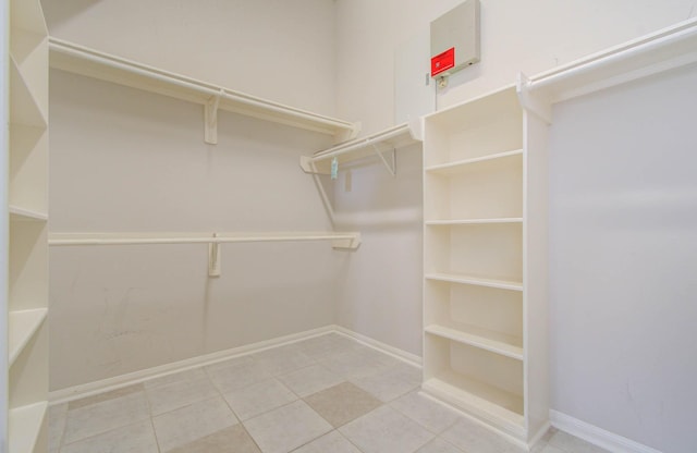 spacious closet featuring tile patterned floors