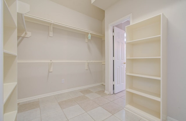 walk in closet featuring tile patterned floors