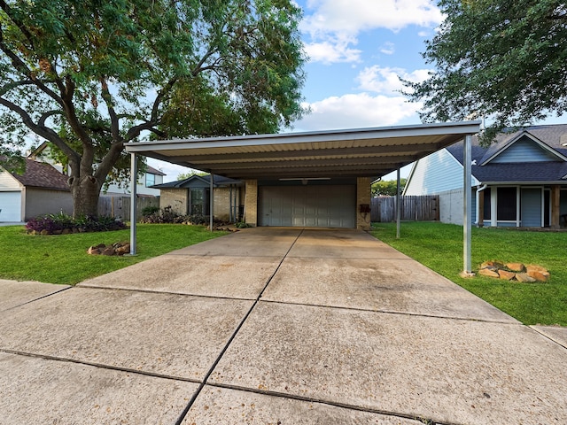 view of parking with a yard, a garage, and a carport