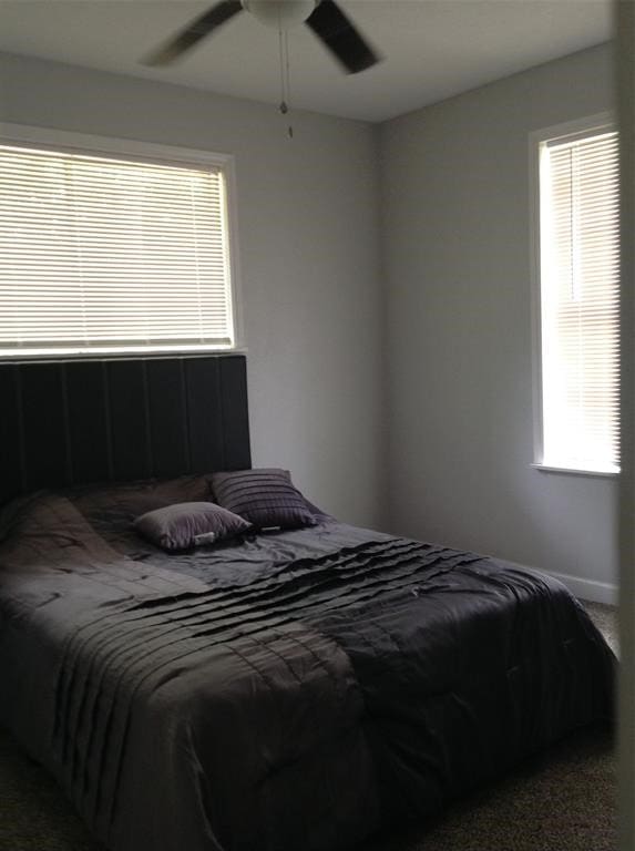 bedroom featuring carpet and ceiling fan