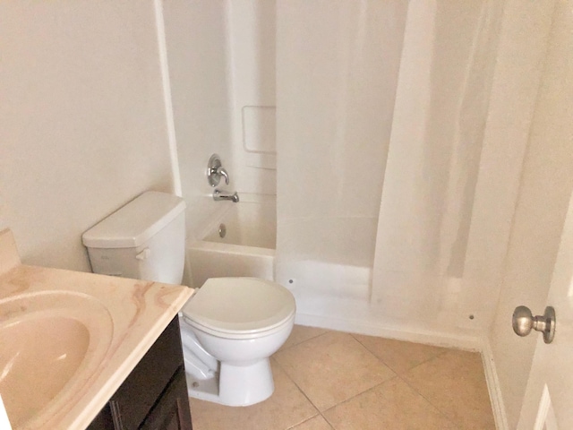 bathroom featuring vanity, toilet, and tile patterned floors