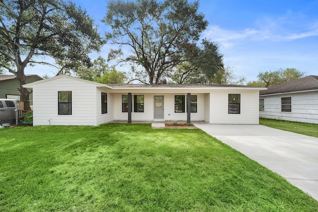 ranch-style house with a front lawn