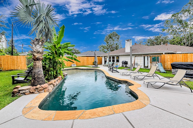 view of pool featuring a patio