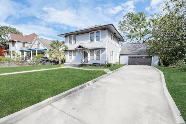 view of front of home with a front yard and a garage