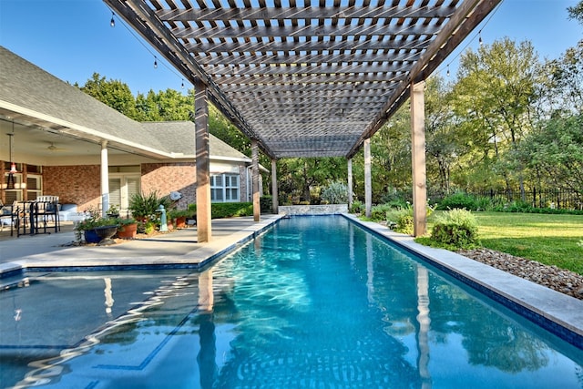 851 Elm Dr, Brenham, TX 77833 - swimming pool with a pergola, a ceiling fan, and a patio area