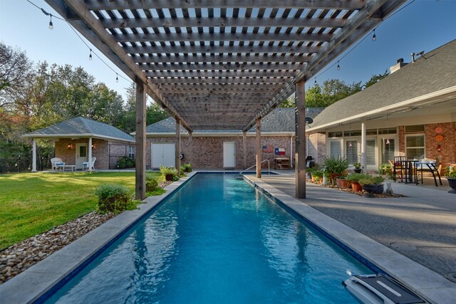 851 Elm Dr, Brenham, TX 77833 - view of pool featuring a pergola, a yard, a patio, and an outdoor structure