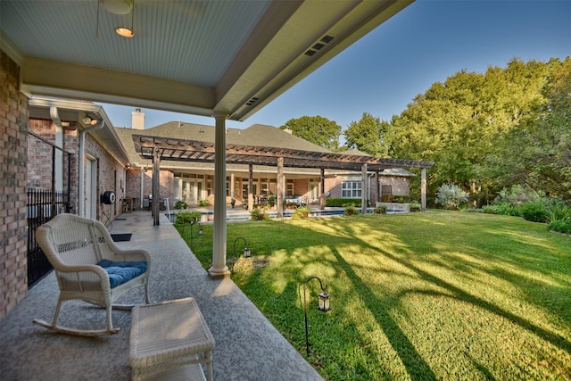 view of yard with a patio and a pergola