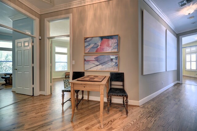 851 Elm Dr, Brenham, TX 77833 - home office featuring crown molding, wood finished floors, and baseboards