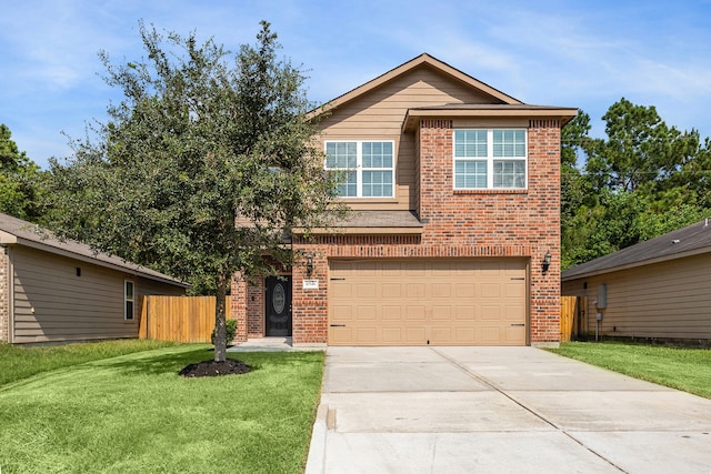 view of front of house featuring a front yard and a garage