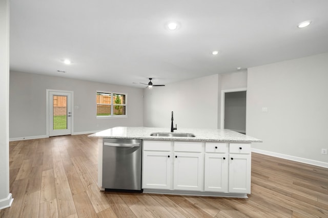 kitchen with white cabinetry, a kitchen island with sink, light hardwood / wood-style flooring, dishwasher, and sink