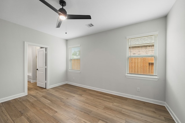 unfurnished bedroom featuring light wood-type flooring and ceiling fan